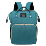 CutieeBag 2.0 - Raffinierte 3 in 1 Wickeltasche mit Kinderbett